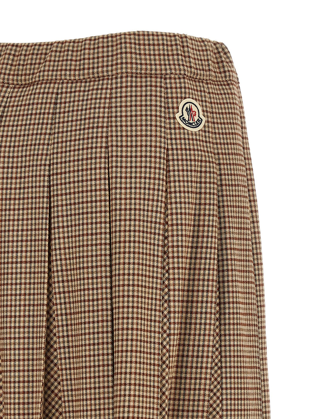 Jupe midi beige en viscose de la marque Moncler, coupe élégante et fluide, visible dans l'image.