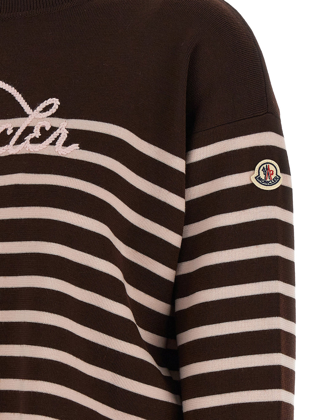 Cardigan en laine vierge blanche Moncler, manches longues, coupe classique, porté sur un fond neutre.