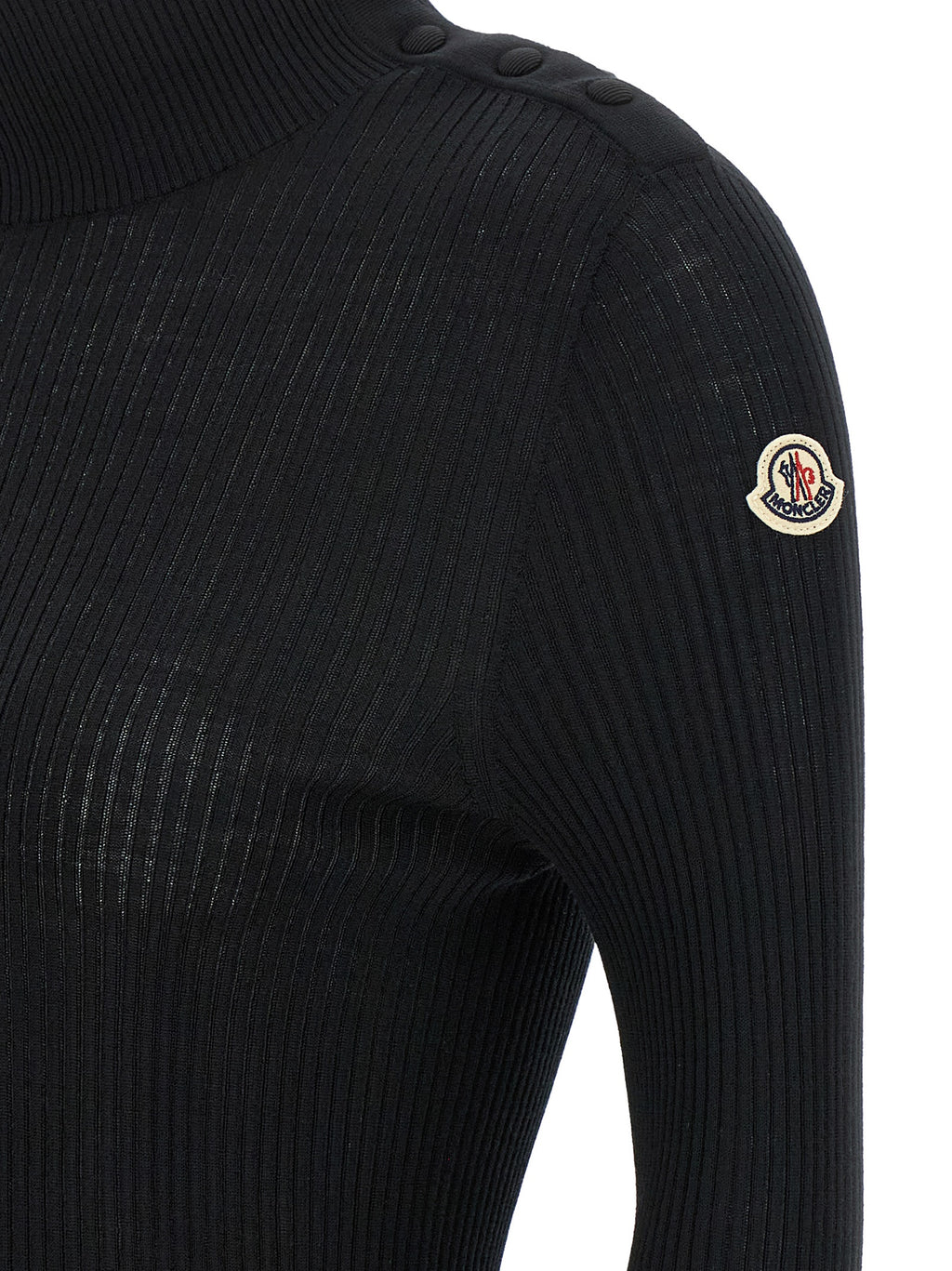 Cardigan noir en laine vierge de la marque Moncler, détail élégant avec boutons sur le devant.