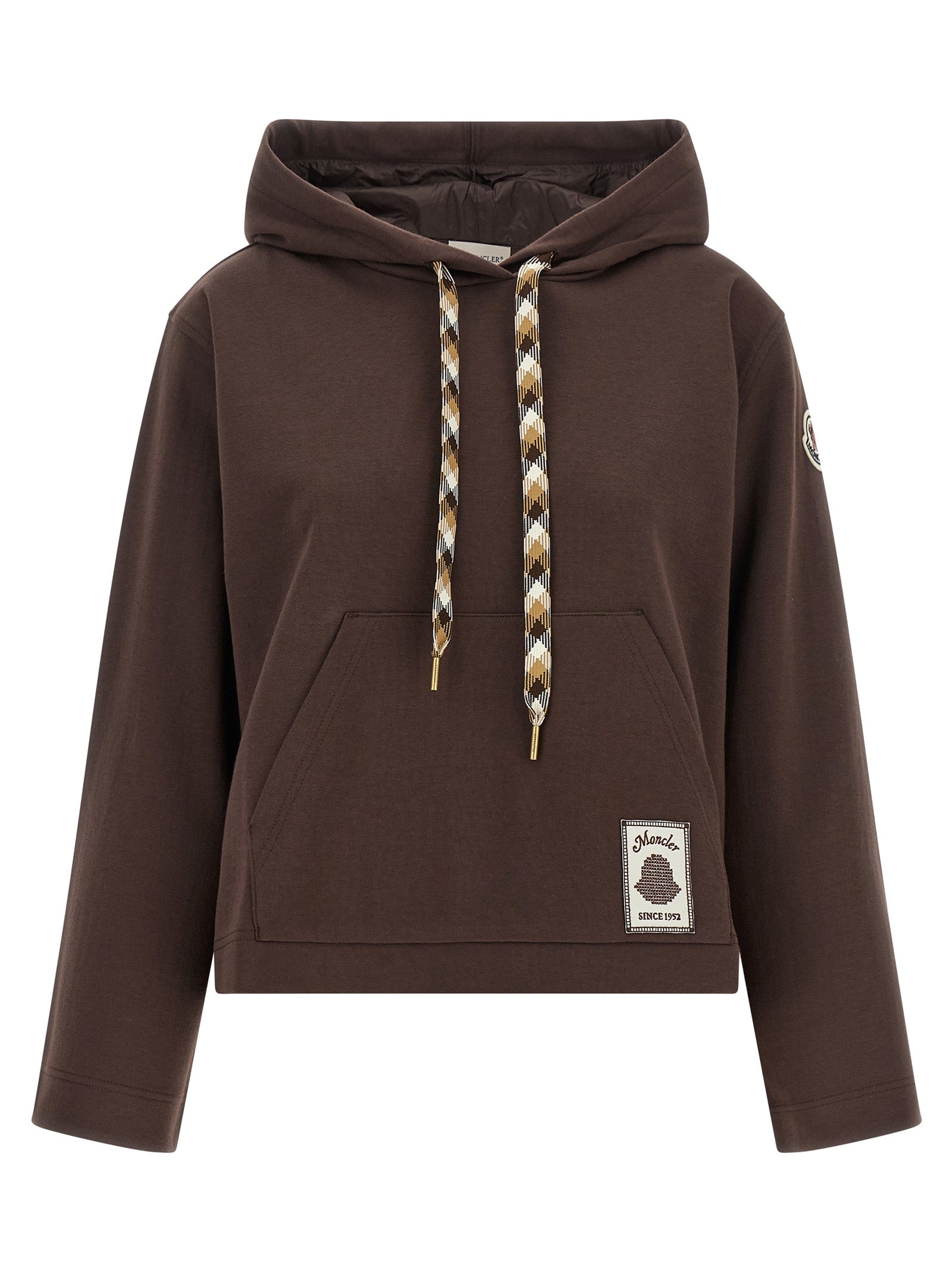 Sweatshirt en coton marron de la marque Moncler, coupe décontractée et logo visible sur la poitrine, vêtement confortable et stylé.