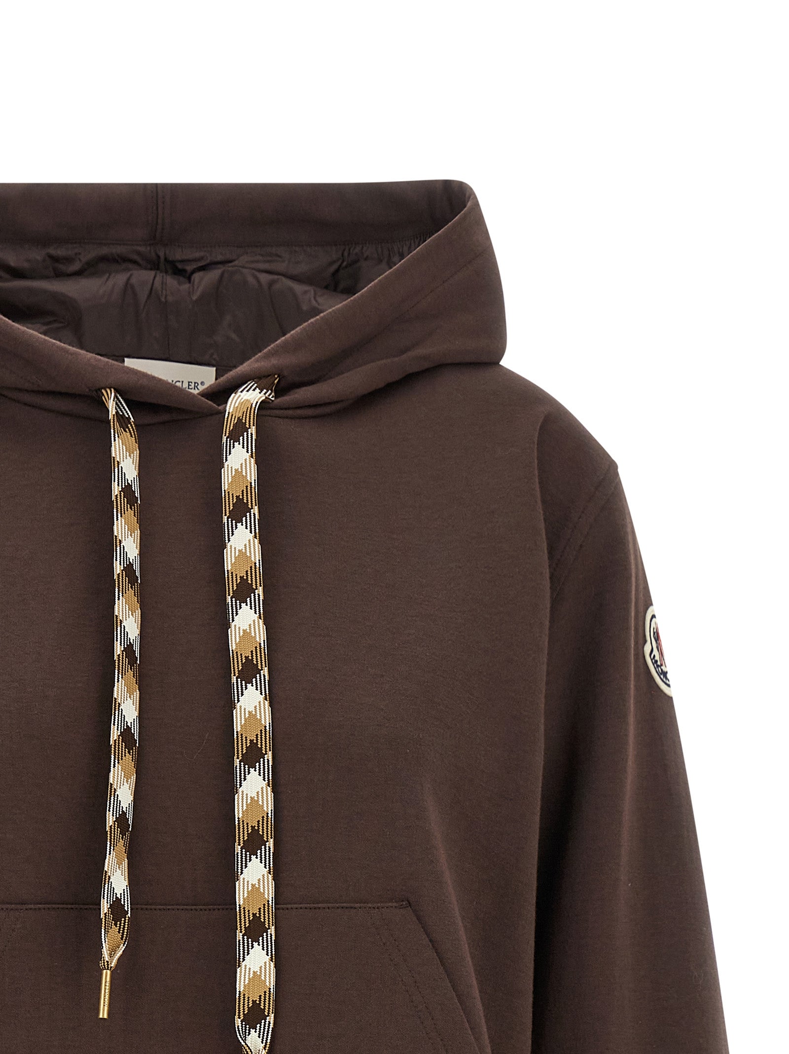 Sweat-shirt marron en coton de la marque Moncler, avec un design décontracté et confortable visible sur l'image.