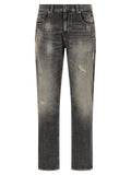 Jeans skinny en coton gris de la marque Diesel, coupe ajustée et tendance, affichés dans une image claire.