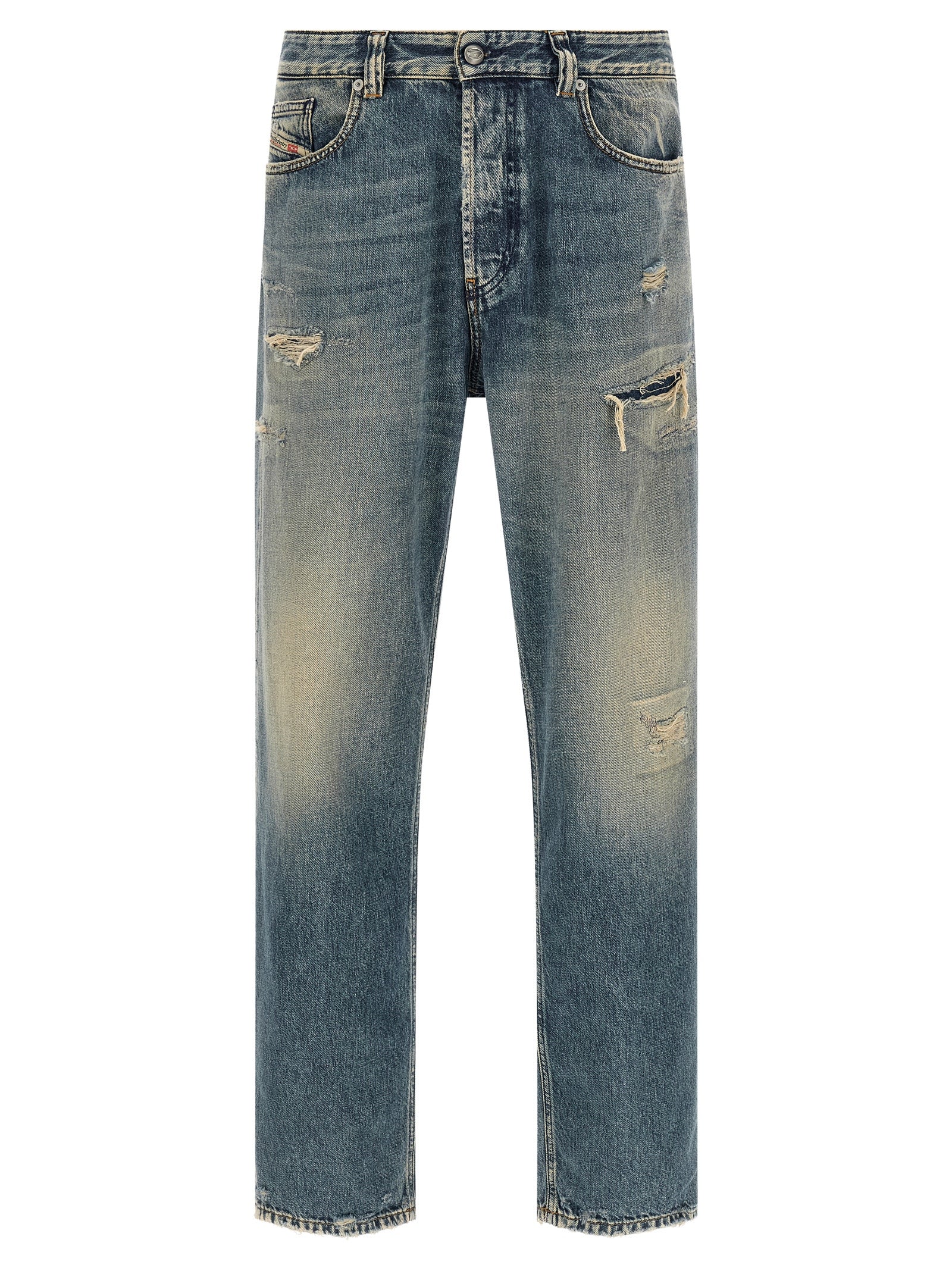 Jeans Diesel en coton bleu, coupe tapered, affichés sur un mannequin, détails de finition et style décontracté visibles.