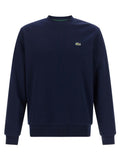 Sweatshirt en coton bleu Lacoste avec logo crocodile, col rond et manches longues, pour homme ou femme.
