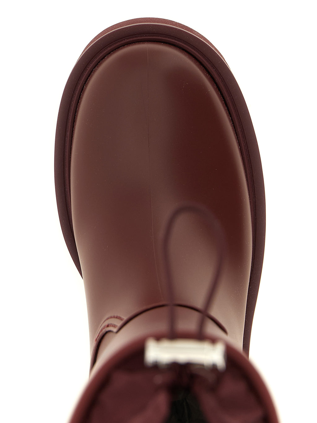 Bottes longues en PVC bordeaux Moncler par-dessus le genou, élégantes et imperméables, pour un style moderne et sophistiqué.