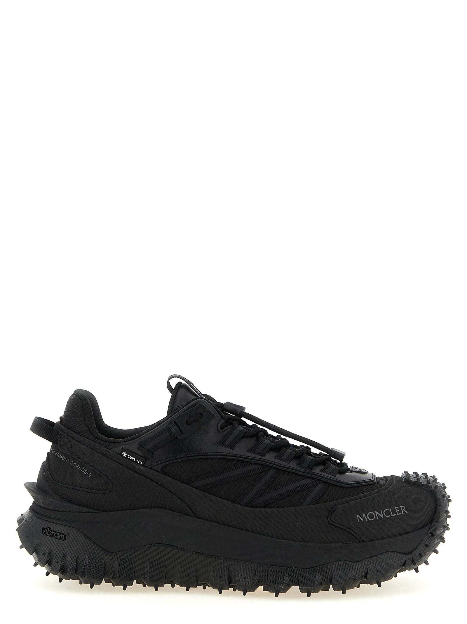 Chaussures de sport en cuir noir Moncler, baskets athlétiques élégantes avec design moderne et semelle robuste.