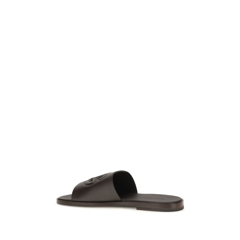 Sandales plates en cuir de veau marron Bos Taurus de Dolce & Gabbana, élégantes et confortables, pour un style sophistiqué.