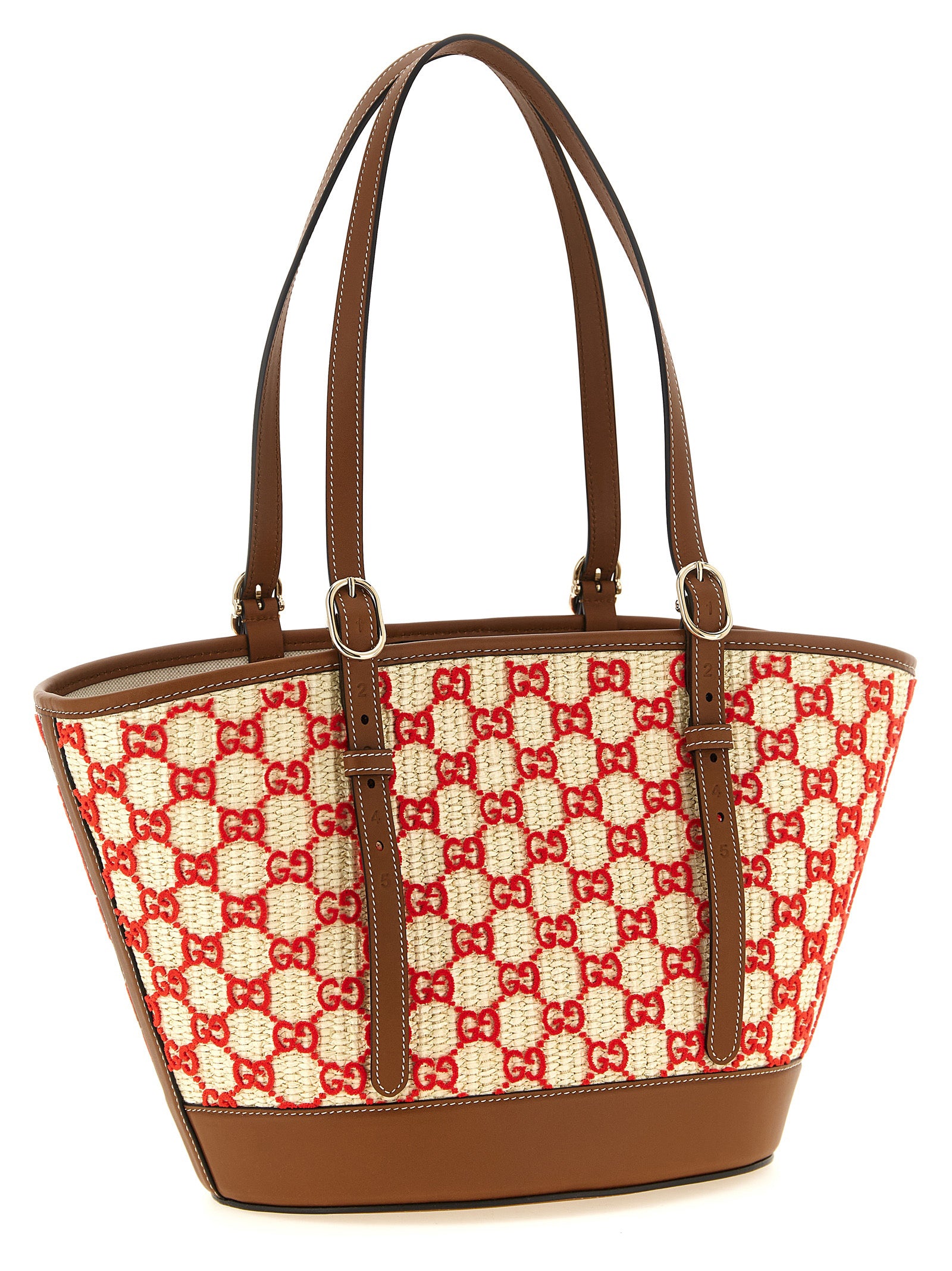 Sac à main Gucci en coton multicolore avec motifs colorés et poignées en cuir, vue de face.