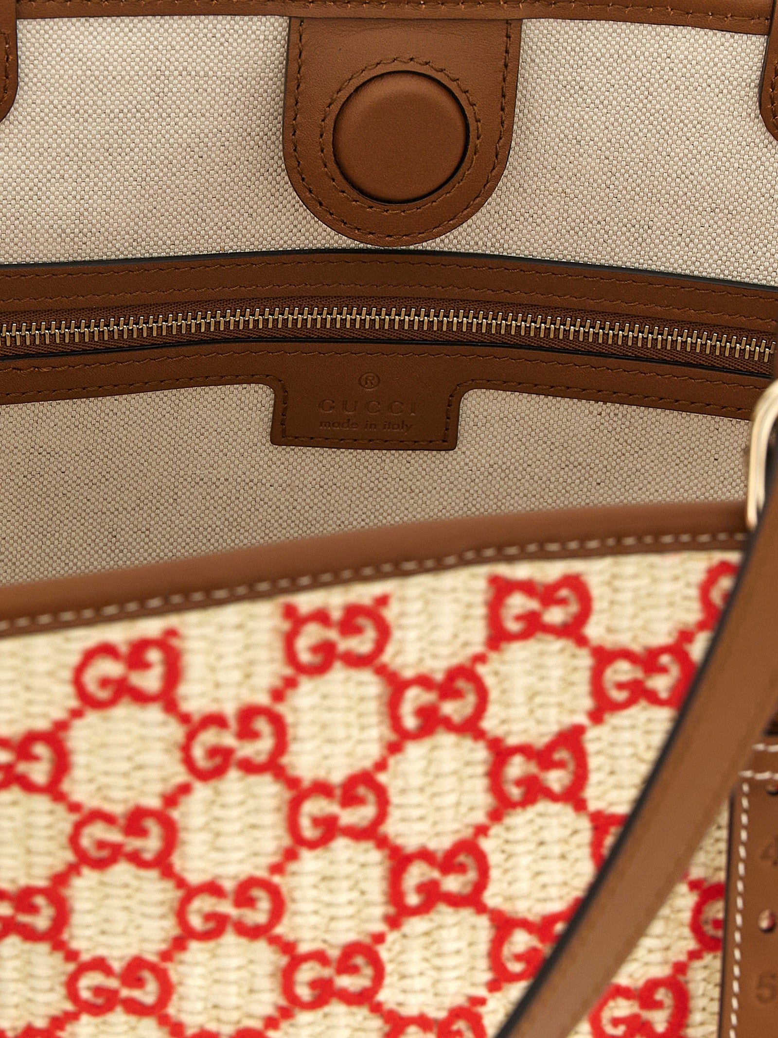 Sac à main en coton multicolore Gucci avec logo, design élégant et coloré, vue de face sur fond blanc.
