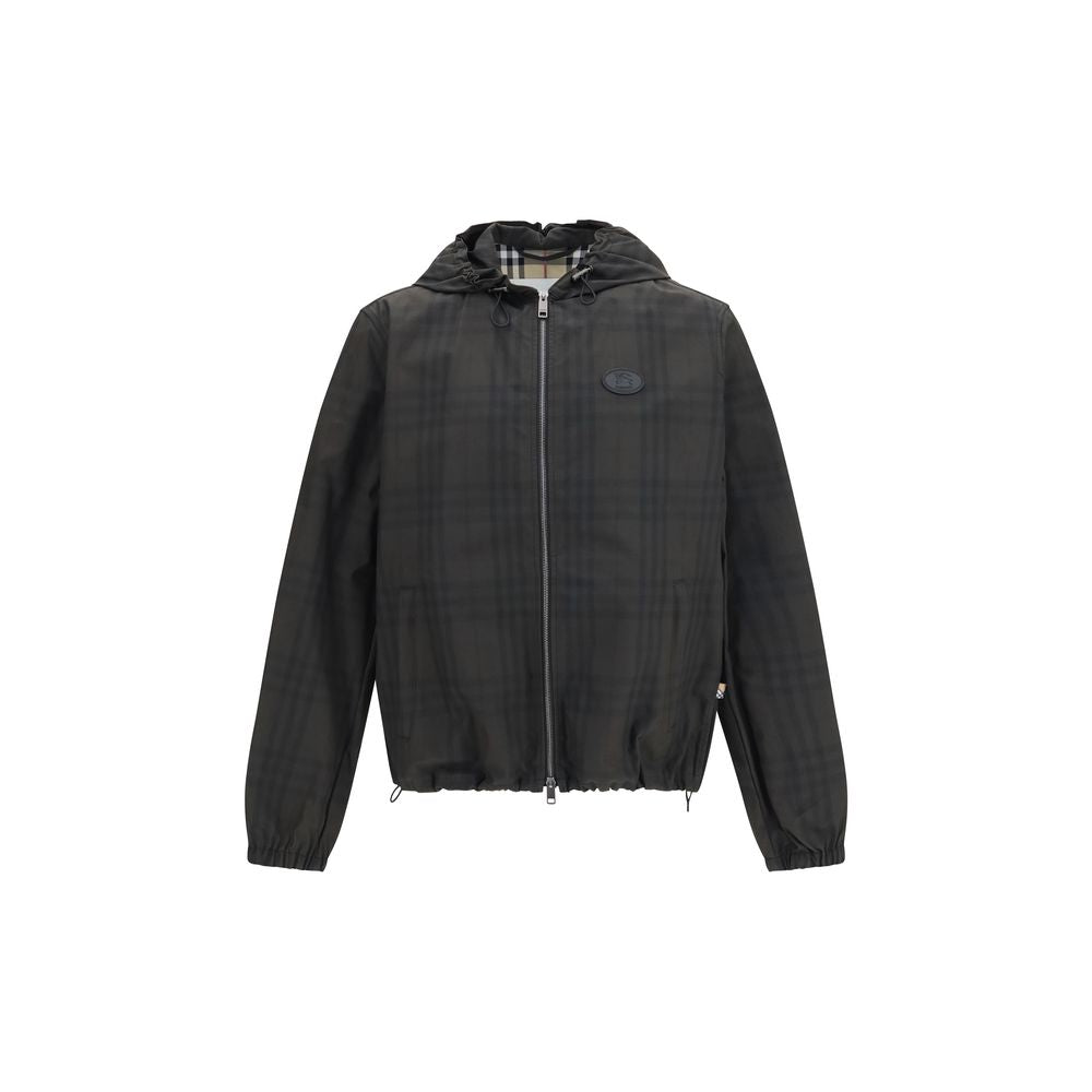 Veste en coton coloris brun de Burberry, coupe légère, avec détails classiques, vue de face sur un fond neutre.
