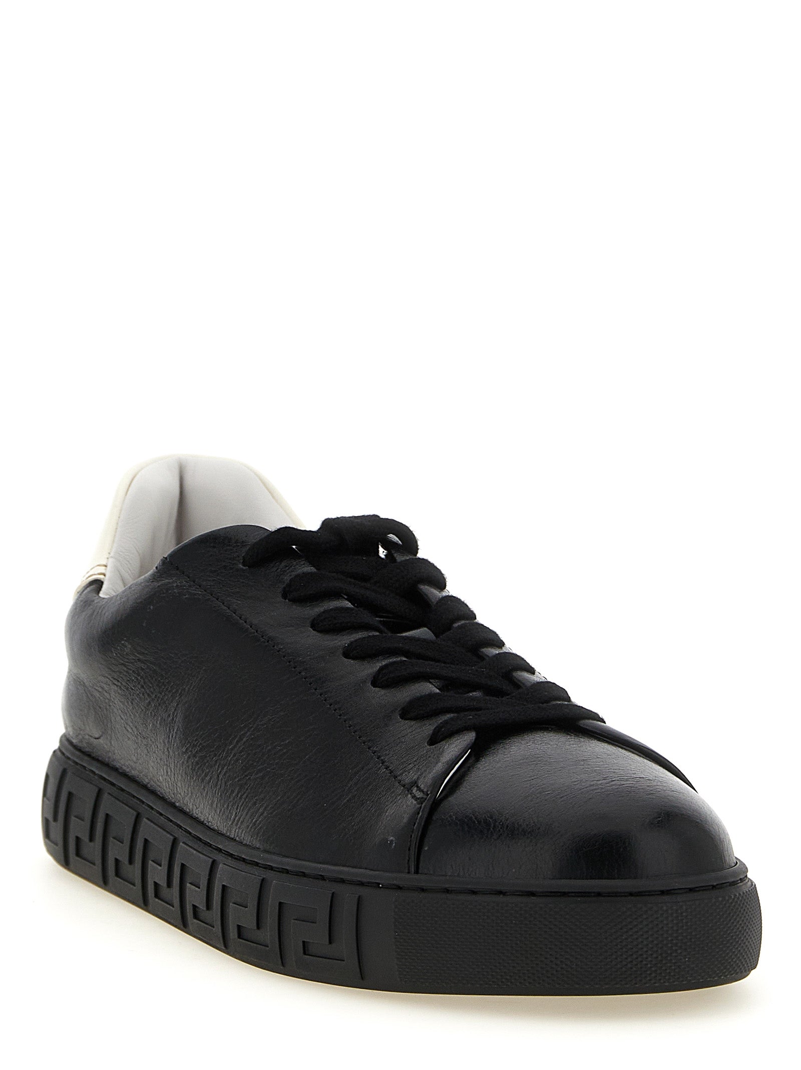 Chaussures basses Versace Bicolor en cuir de veau, style moderne et élégant, pour un look sophistiqué.