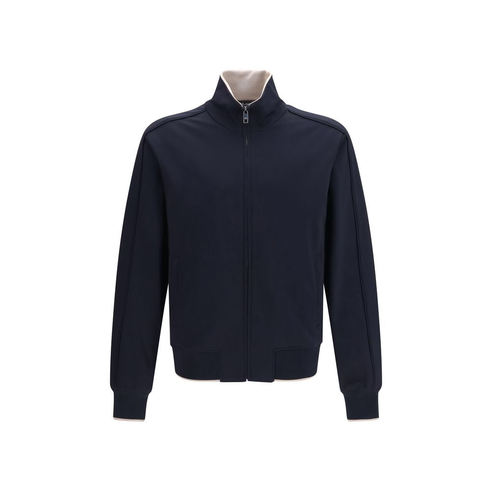 Veste longue en polyamide bleue de Dolce & Gabbana, coupe élégante, avec détails modernes, adaptée pour un style sophistiqué.