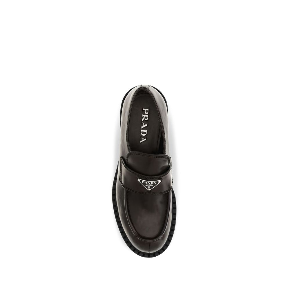 Chaussures Prada en cuir de veau marron Bos Taurus, mocassins slip-on élégants et confortables pour homme.