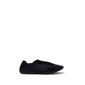 Chaussures de sport Prada en caoutchouc bleu, baskets athlétiques modernes et confortables, vue de face sur sneakers Prada.