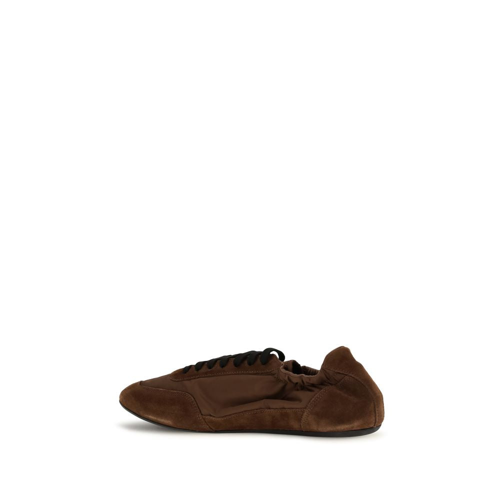 Chaussures de sport Prada en caoutchouc marron, baskets athlétiques décontractées avec semelle épaisse et design moderne.