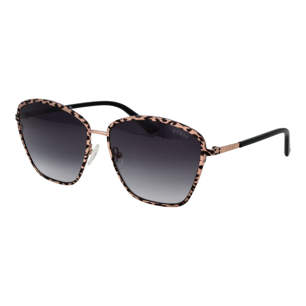 Lunettes de soleil en métal or rose Guess, design élégant avec monture fine et verres teintés pour un style sophistiqué.