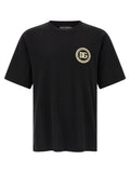 T-shirt en coton noir de Dolce & Gabbana, coupe classique, avec logo discret sur la poitrine, vue de face.