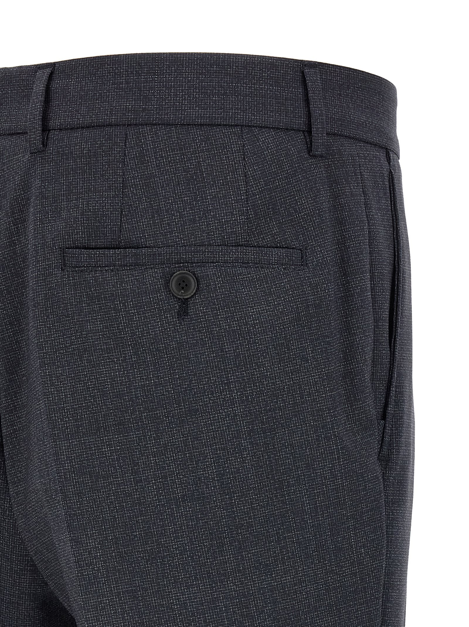Costume deux pièces en polyester bleu Hugo Boss, veste et pantalon élégants pour homme.