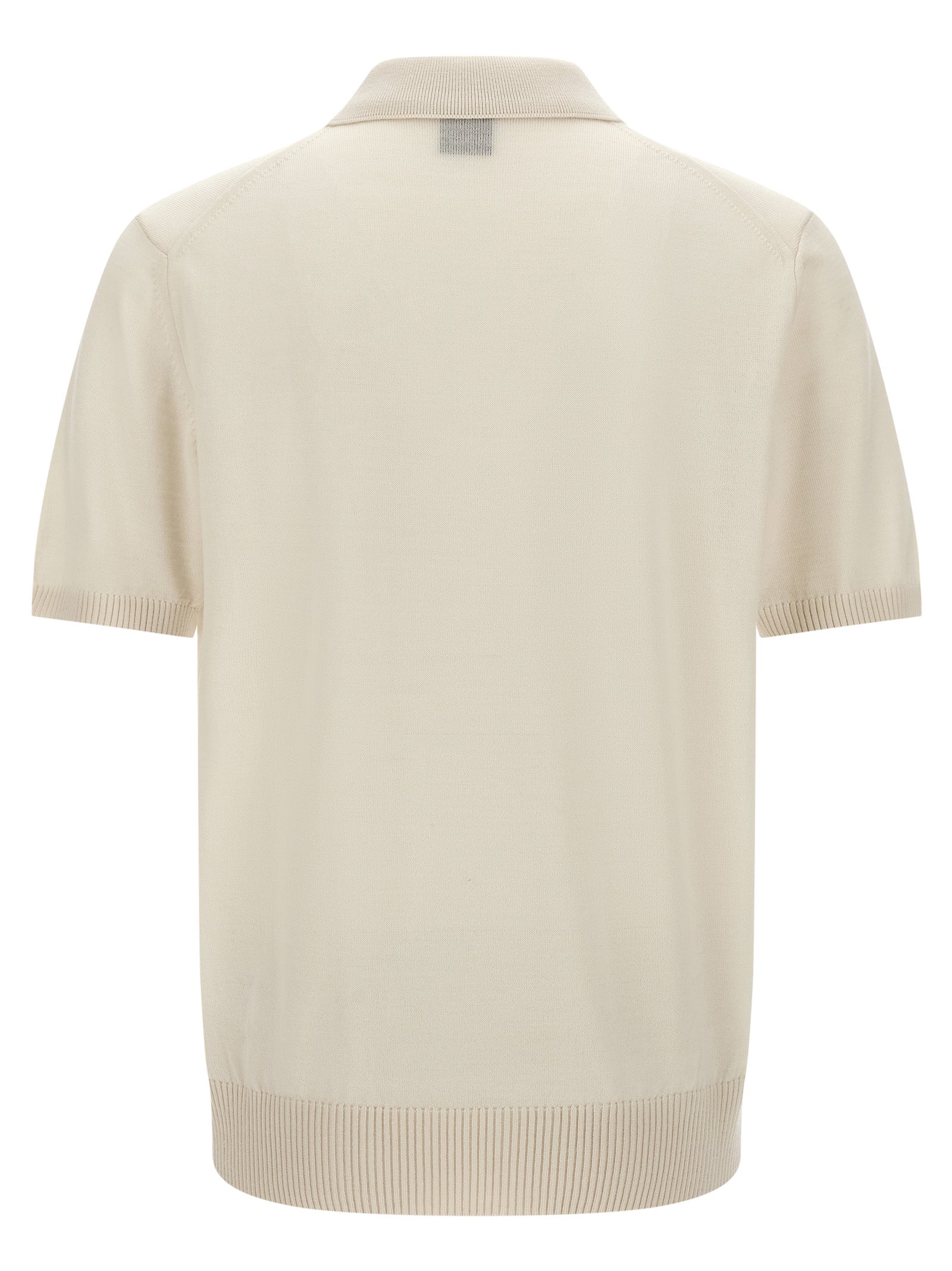 Chemise polo blanche en laine vierge de Hugo Boss, vue de face, détails du col et des boutons visibles.