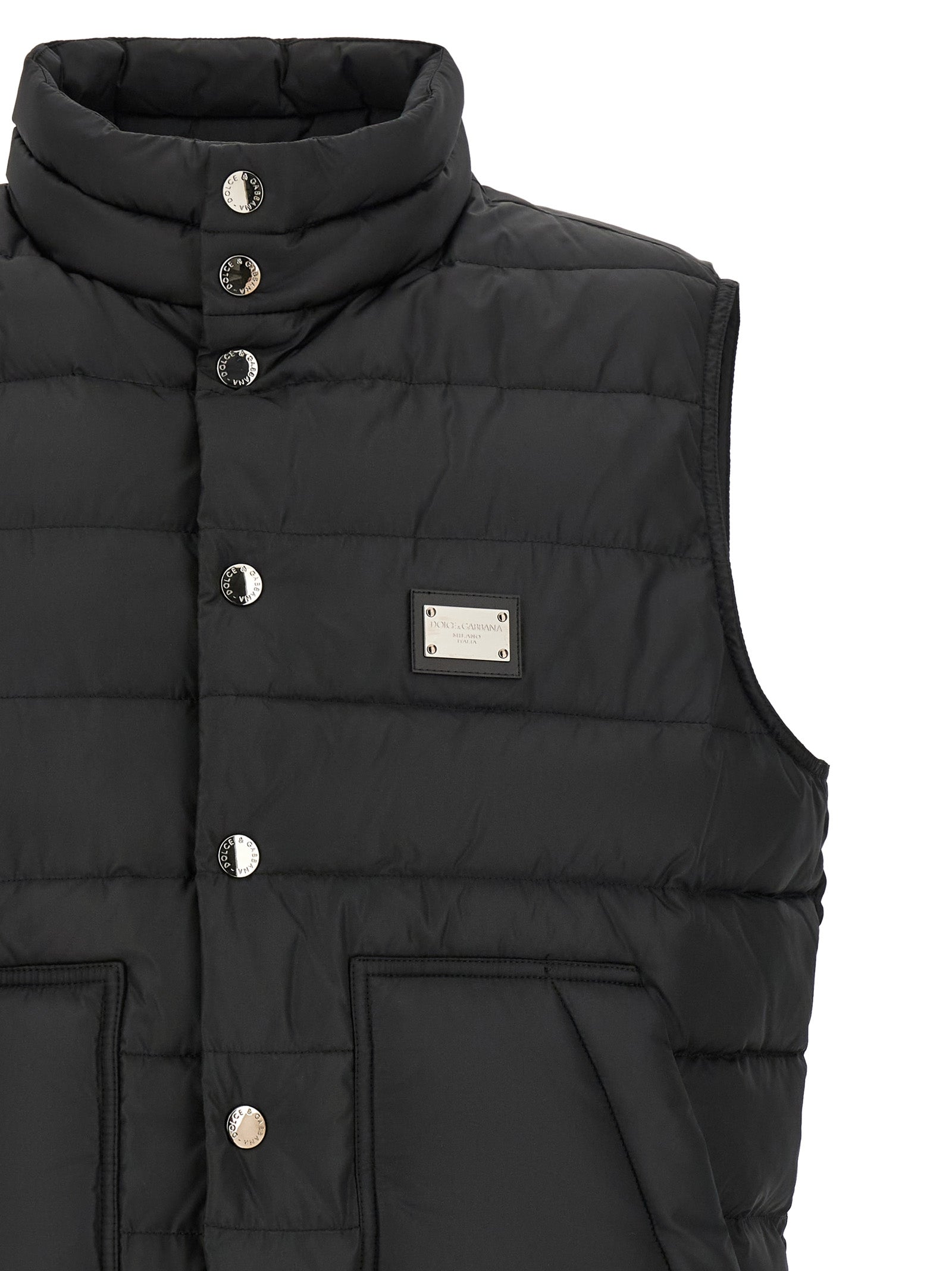 Veste sans manches en polyester noir de Dolce & Gabbana, élégante et moderne, visible sur fond neutre.