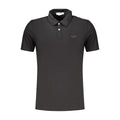 Polo pour hommes Guess Jeans en coton noir, col classique et logo Guess visible, style décontracté et élégant.