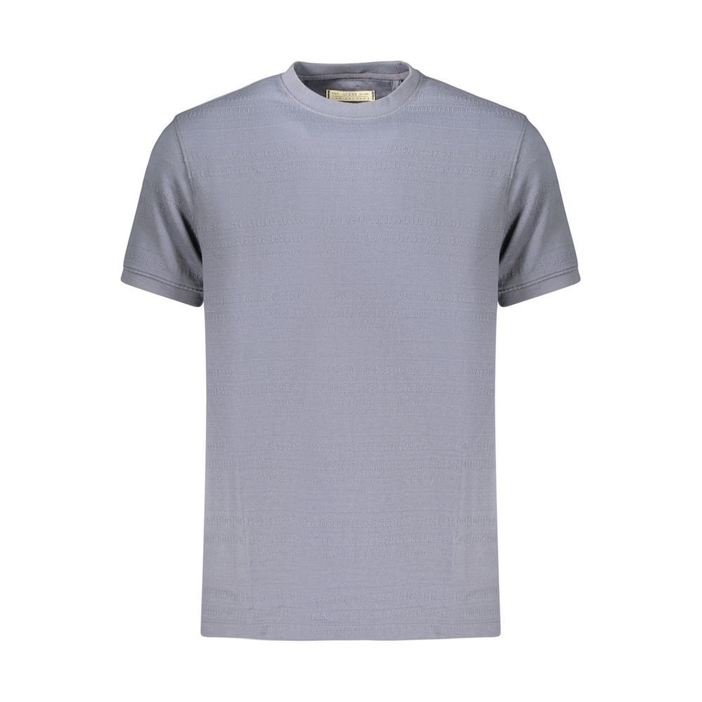 T-shirt pour homme Guess Jeans en coton bleu, style décontracté, avec logo Guess visible sur le devant.