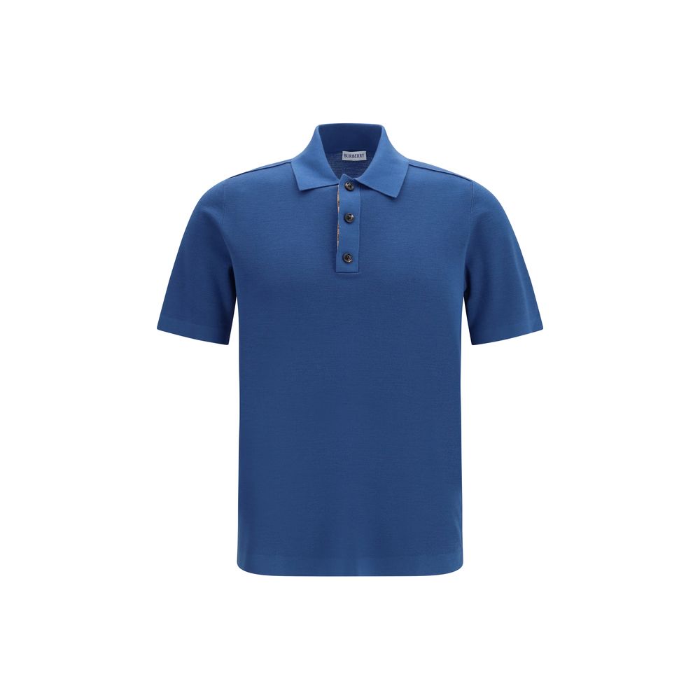 Chemise polo en laine bleue Burberry avec logo Aries, détail classique, porté sur mannequin, style élégant et décontracté.