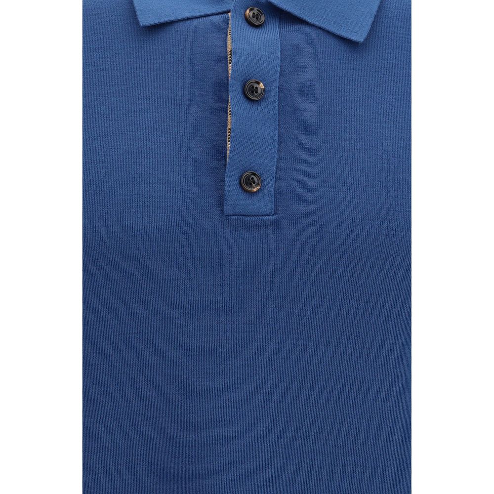 Polo en laine bleue Burberry Oves Aries avec col classique et logo brodé, idéal pour un style élégant et décontracté.