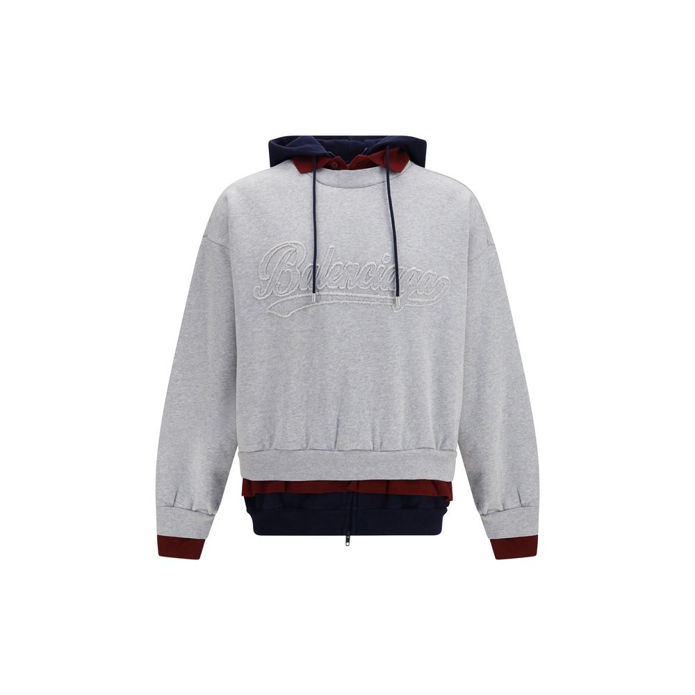 Sweat-shirt multicolore en coton de Balenciaga, avec logo et design moderne, porté sur mannequin.