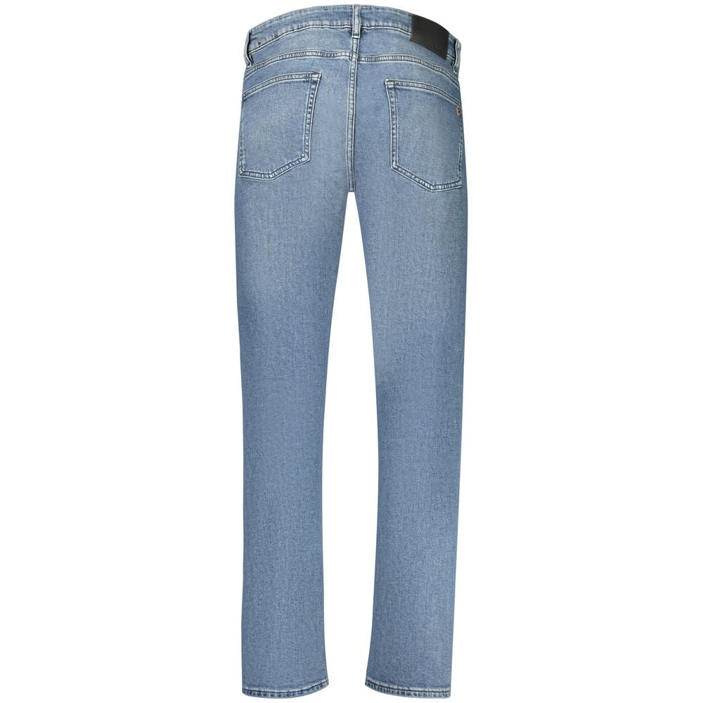 Jeans slim en coton bleu pour homme de la marque Hugo Boss, coupe ajustée et style classique.