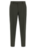 Pantalon bicolore en laine vierge de Hugo Boss, coupe élégante et moderne, visible en détail sur l'image.