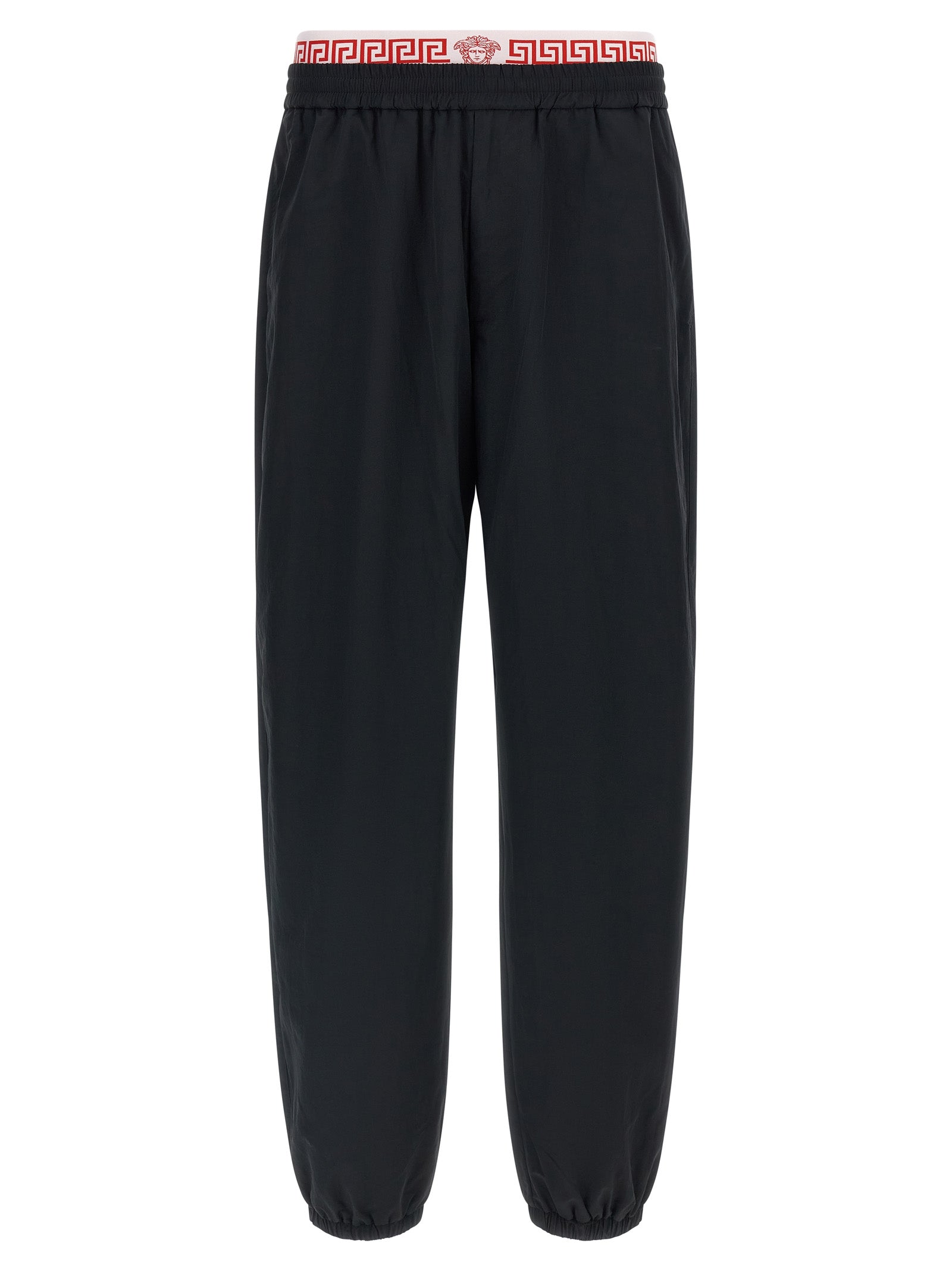 Pantalons de sport noirs Versace en polyamide, joggers élégants pour l'entraînement et le confort.