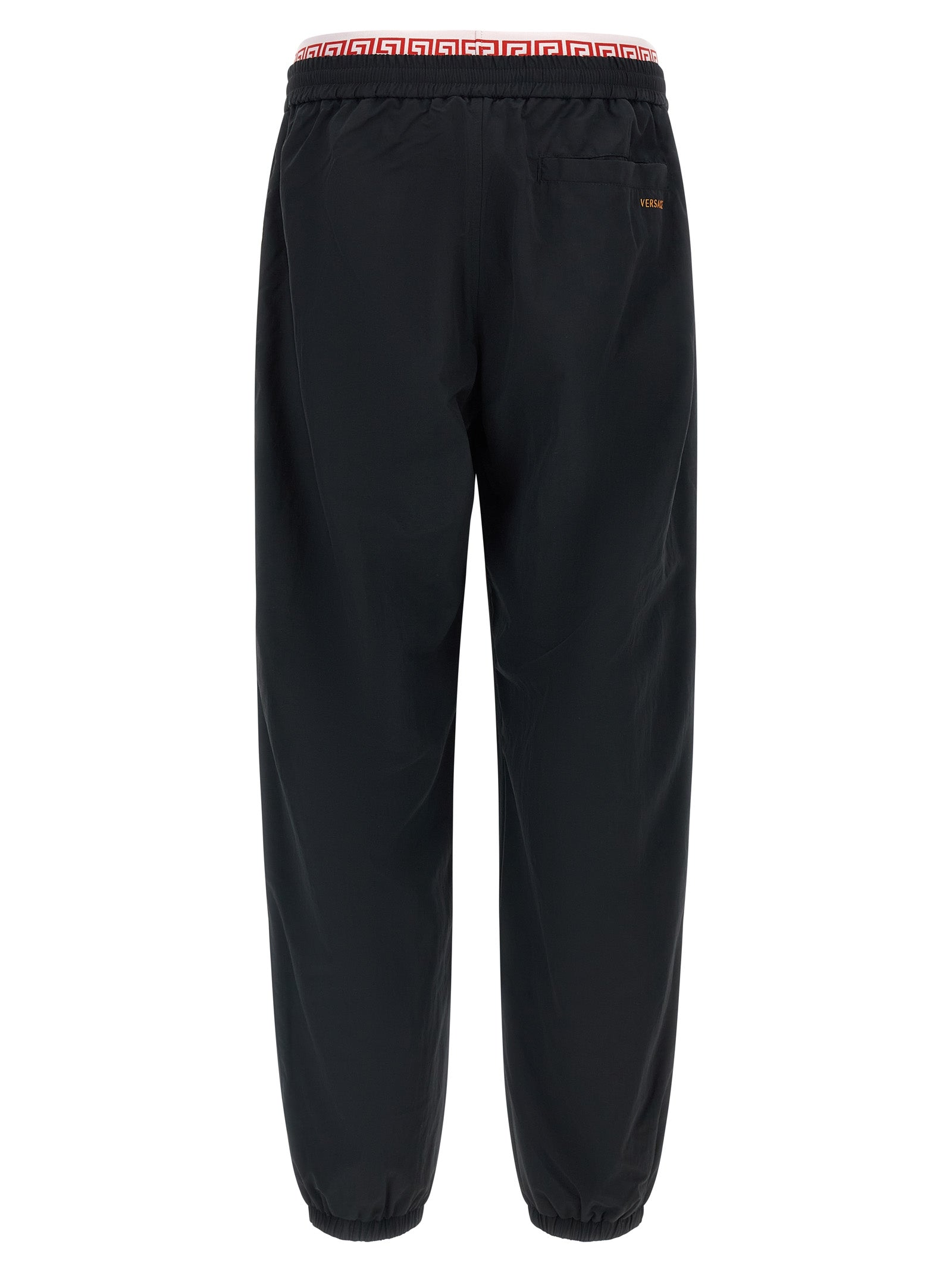 Pantalons de sport noirs Versace en polyamide, joggers décontractés avec logo de la marque, pour homme ou femme.