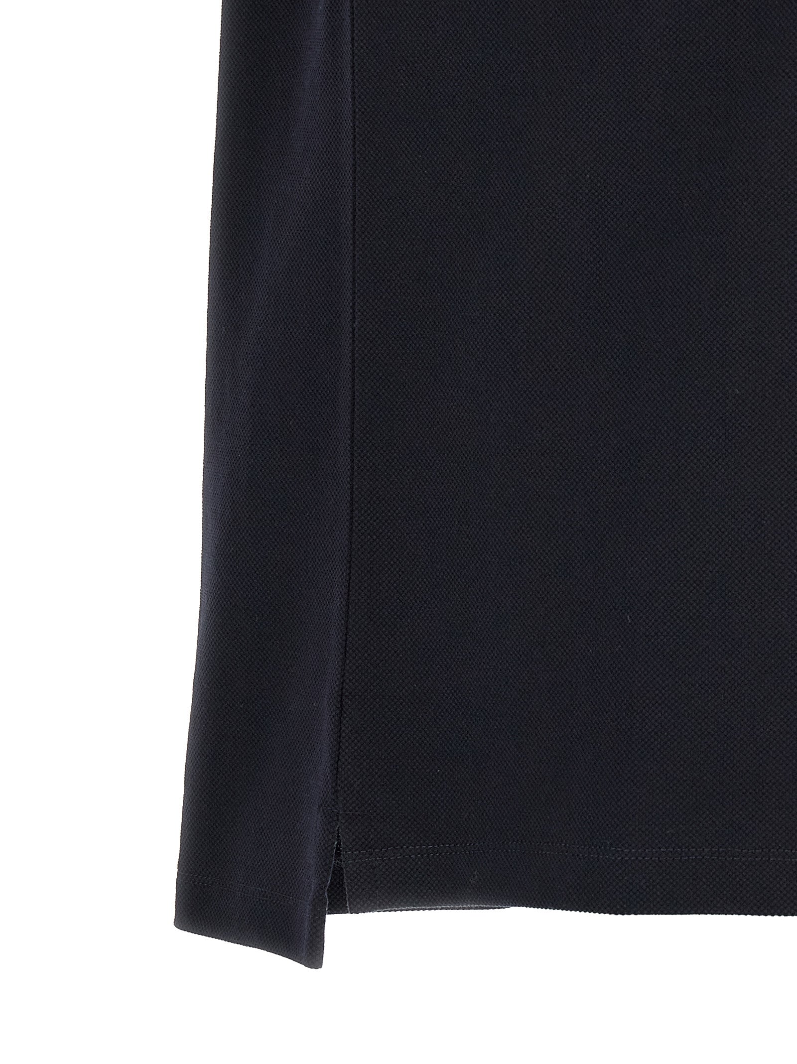 Chemise polo en coton bleu Gucci, vue de face, avec col et boutons, conçue pour un look élégant et décontracté.