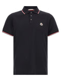 Chemise polo bleue en coton Moncler, vêtement élégant avec col et boutons, tissu doux et confortable.