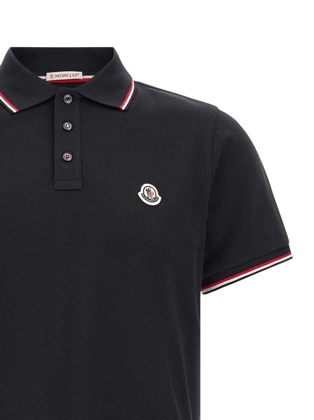 Chemise polo en coton bleu Moncler avec col et boutons, portée décontractée, vue de face.