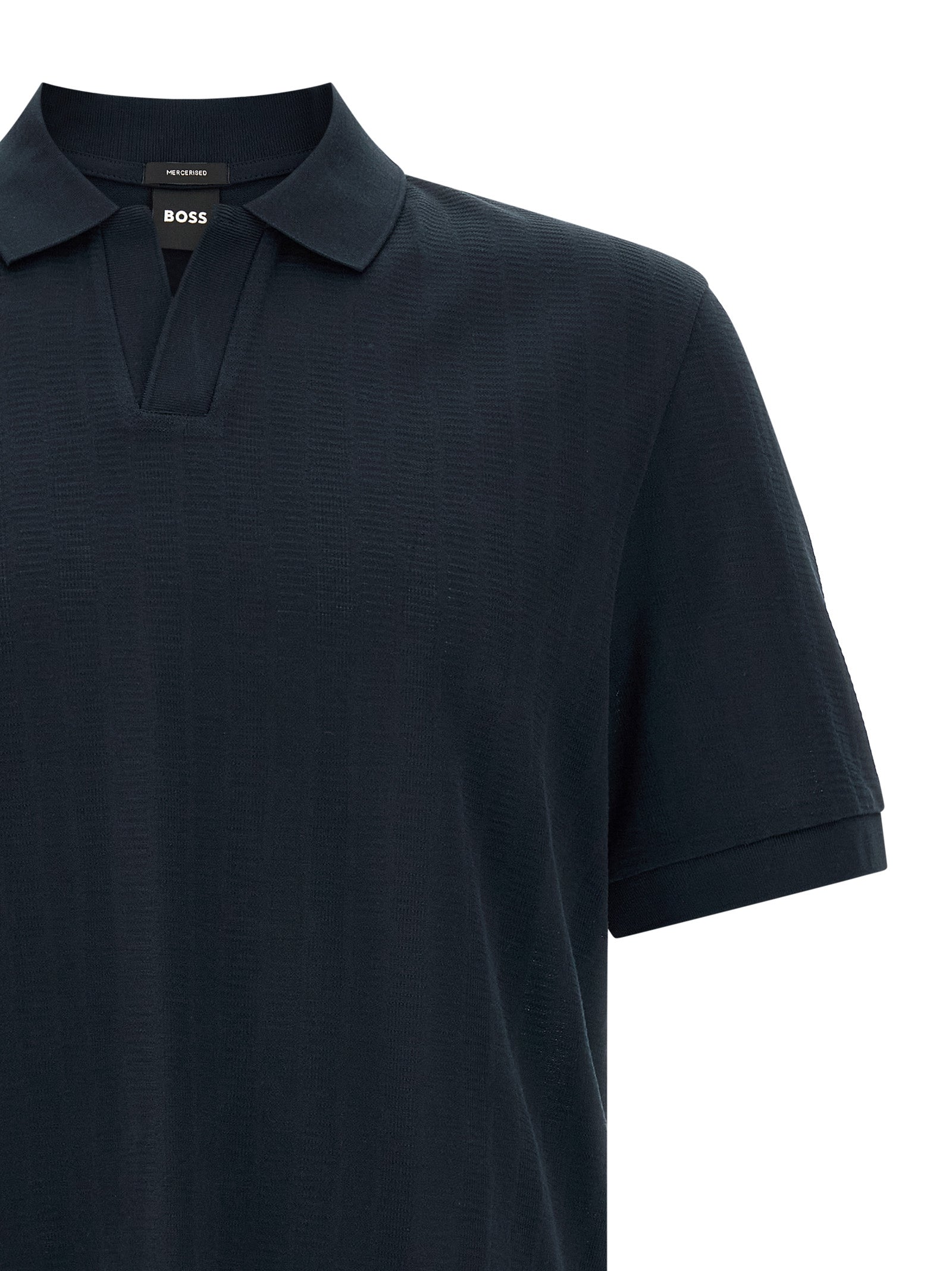 Chemise polo en coton bleu de la marque Hugo Boss, vue de face, avec col et boutons visibles.