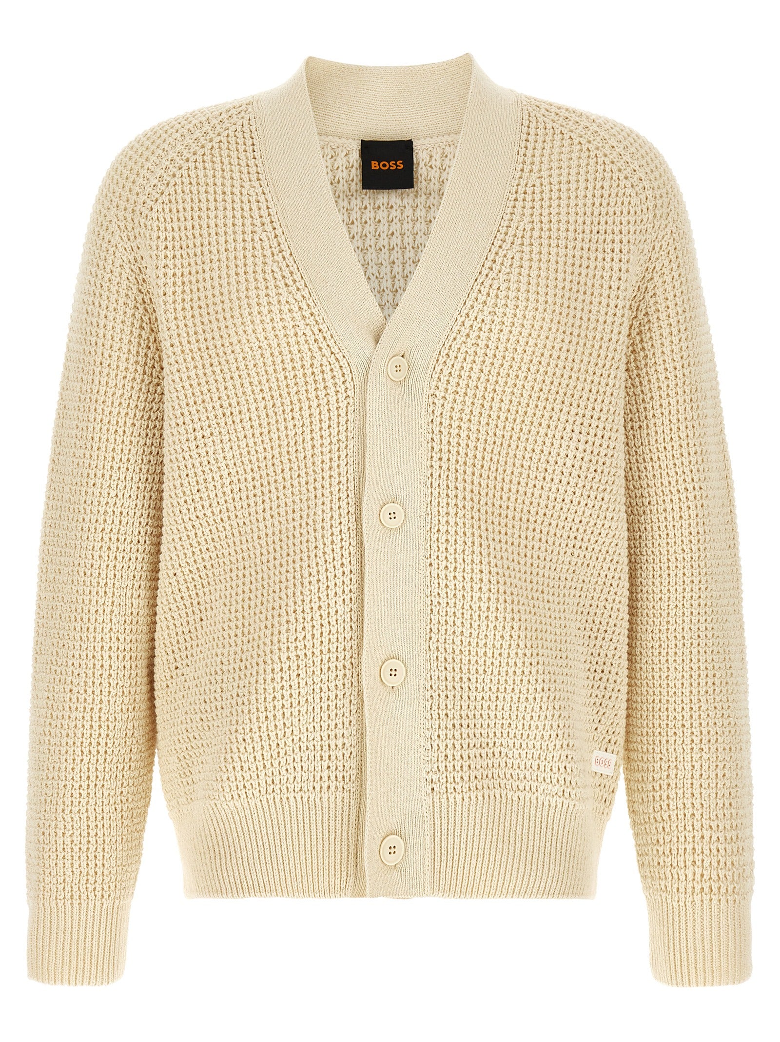 Cardigan beige en coton de la marque Hugo Boss, détail du tissu et coupe élégante visible sur l'image.