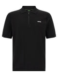 Chemise polo noire en coton de la marque Hugo Boss, vue de face, avec col et boutons visibles.