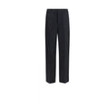 Pantalon décontracté en coton noir de Prada, style casual avec coupe moderne, visible en gros plan sur le produit.