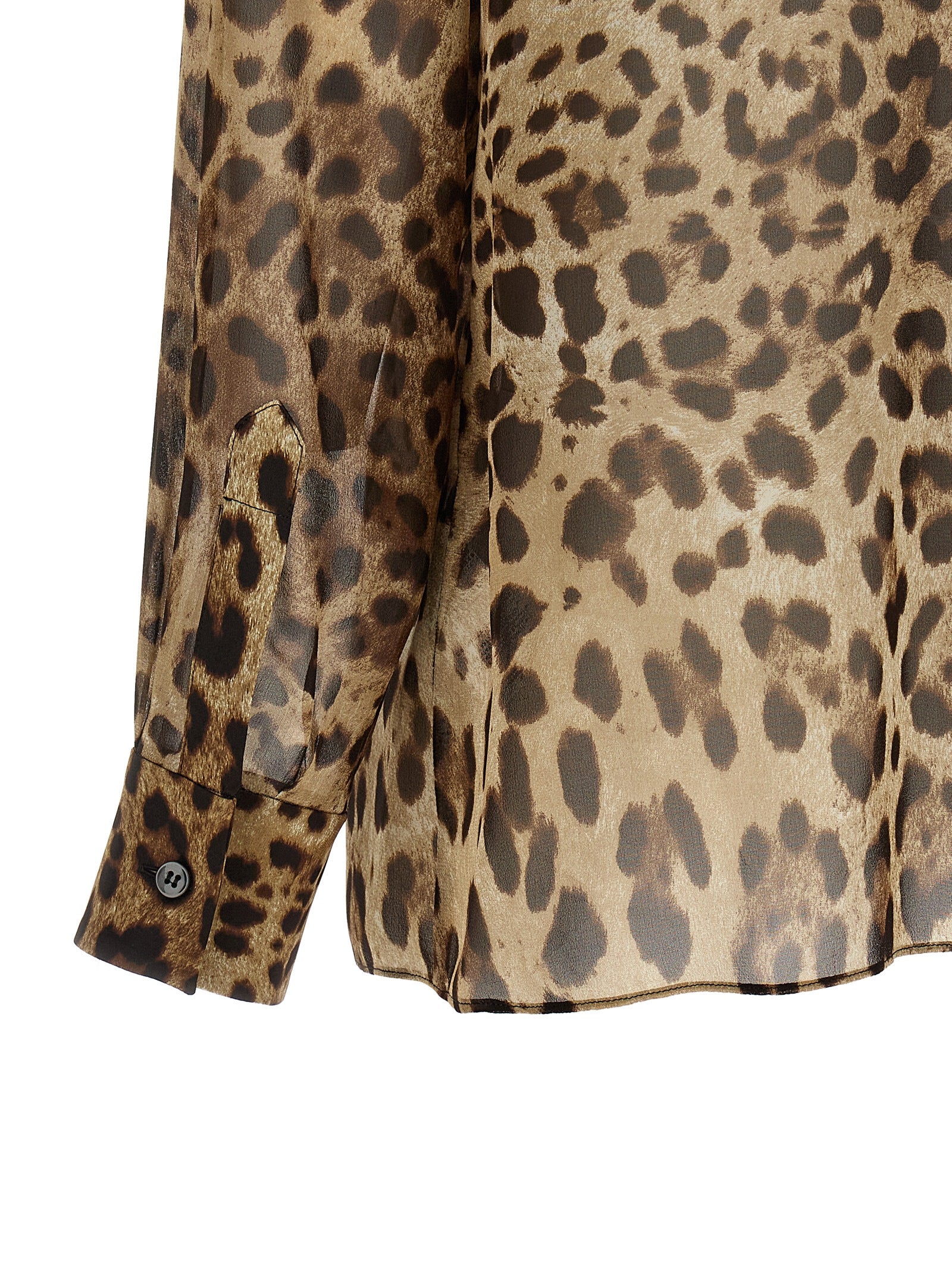 Blouse en soie marron de Dolce & Gabbana, élégante et fluide, avec un design sophistiqué et des détails raffinés.