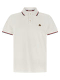 Chemise polo blanche en coton Moncler avec col et boutons, vue de face.