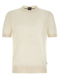 T-shirt blanc en laine vierge de la marque Hugo Boss, vue de face sur un fond neutre.