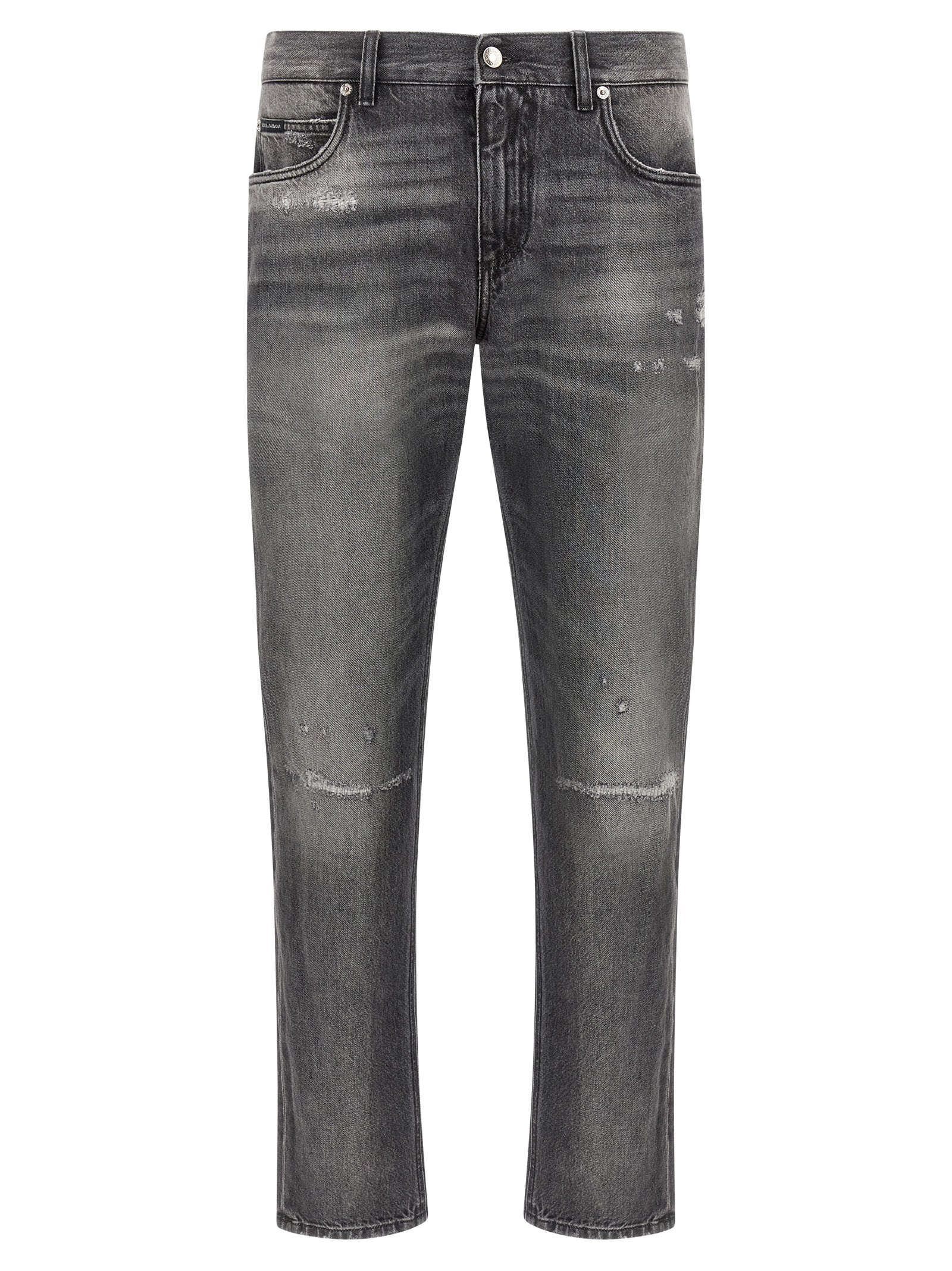Jeans en denim gris Dolce & Gabbana en coton, coupe classique avec poches et coutures apparentes, porté sur un mannequin.