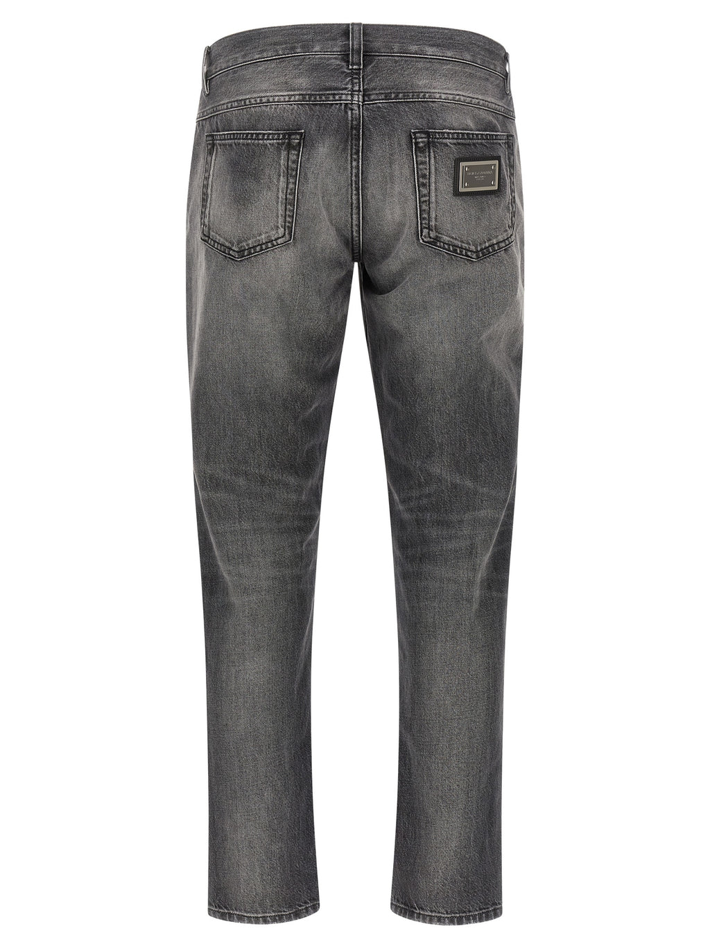Jeans en denim gris Dolce & Gabbana en coton, coupe classique et détails authentiques, sur un fond neutre.