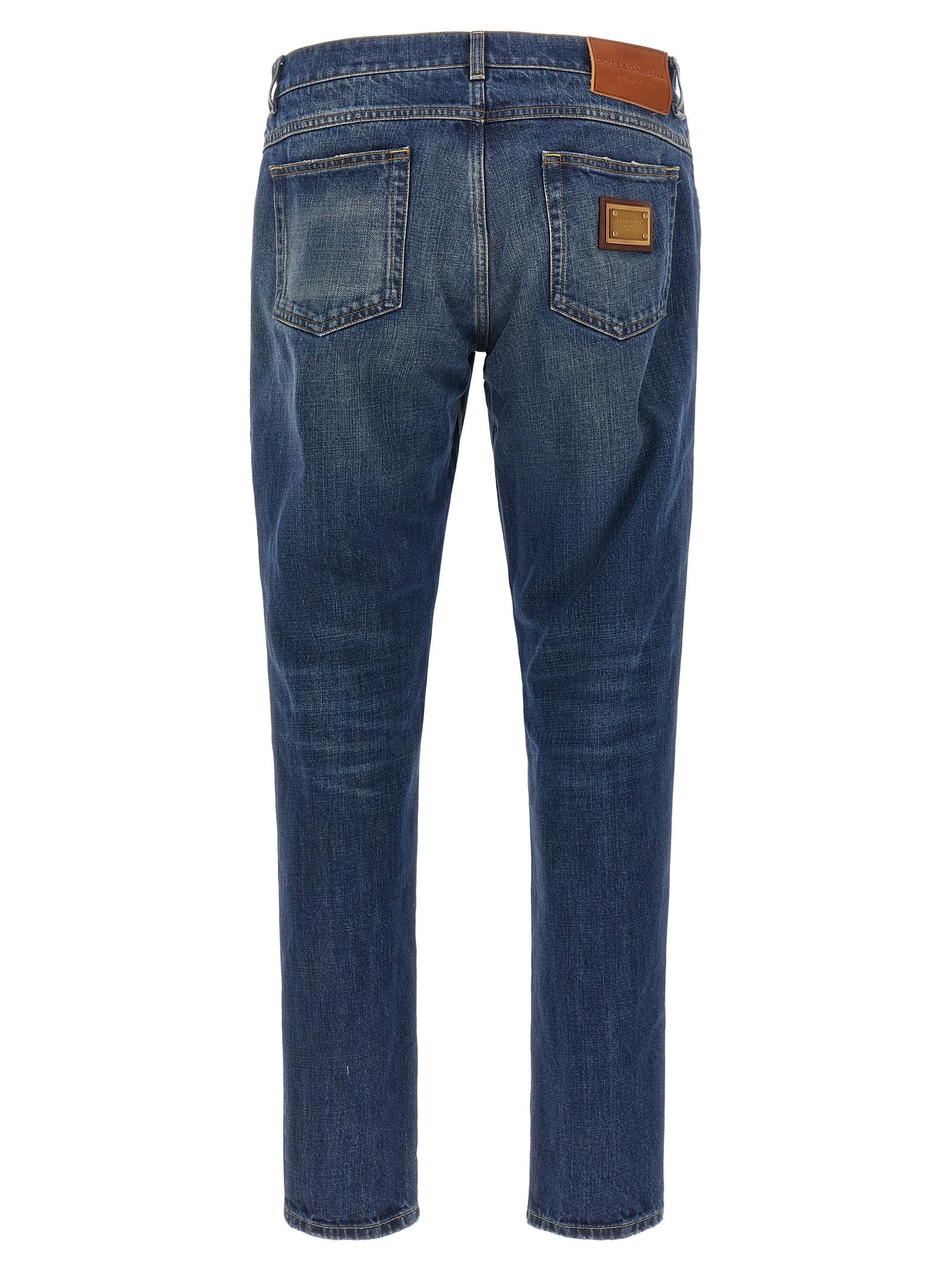 Jeans en coton bleu Dolce & Gabbana, coupe droite, détail classique, vêtement pour homme ou femme, visible de face.