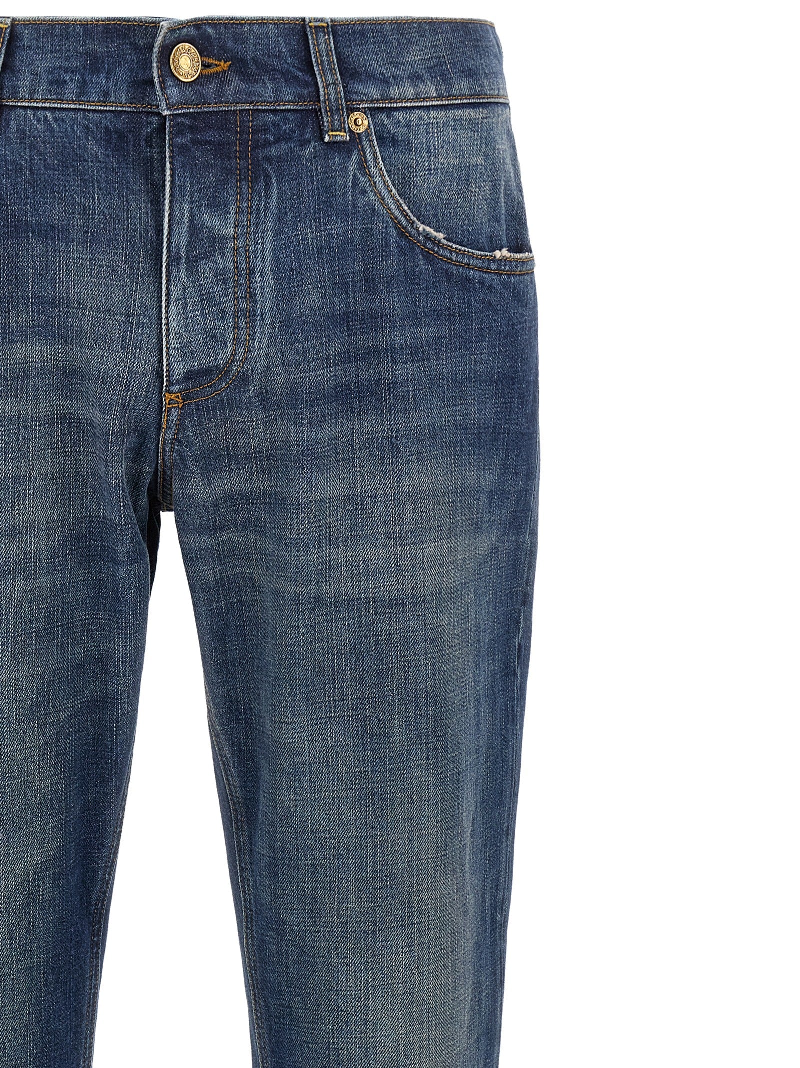 Jeans droits en coton bleu Dolce & Gabbana, mode élégante, détails visibles, coupe classique, tissu confortable.