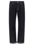 Jeans en denim en coton bleu Dolce & Gabbana, coupe classique, visibles détails de couture et texture du tissu.