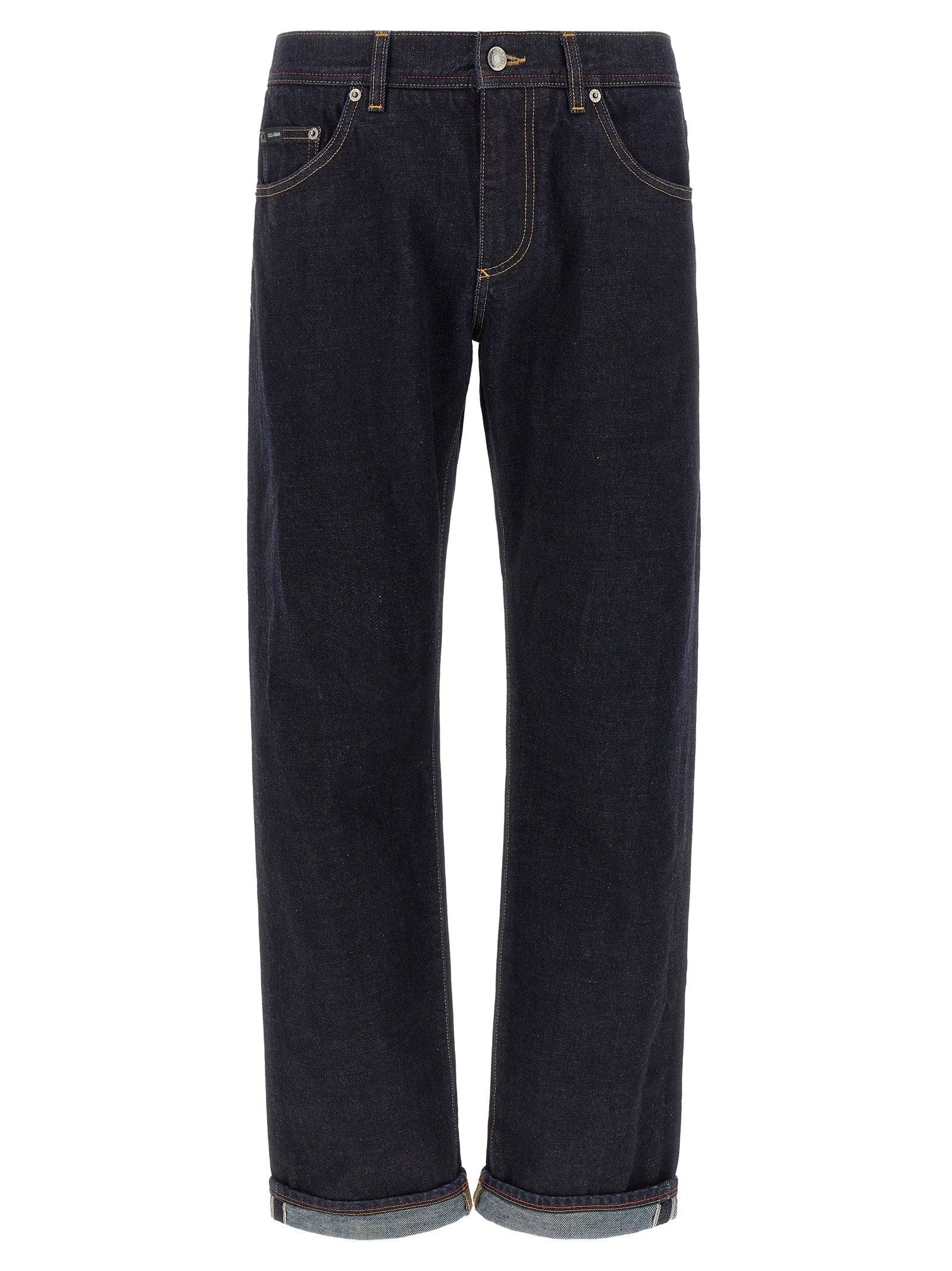 Jeans en denim en coton bleu Dolce & Gabbana, coupe classique, visibles détails de couture et texture du tissu.