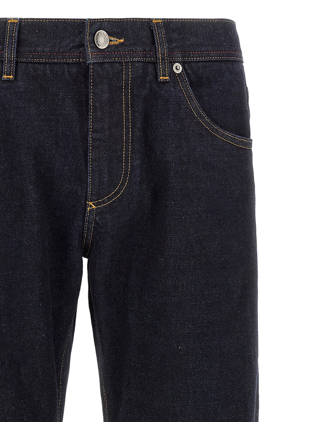 Jeans en denim en coton bleu Dolce & Gabbana avec coupe classique et détails modernes, porté sur un mannequin.